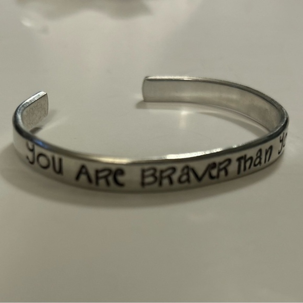 “You are braver than you Believe “ silver tone cuff bracelet